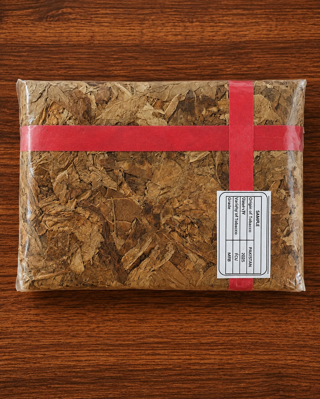 White plate of hand-stripped golden tobacco lamina